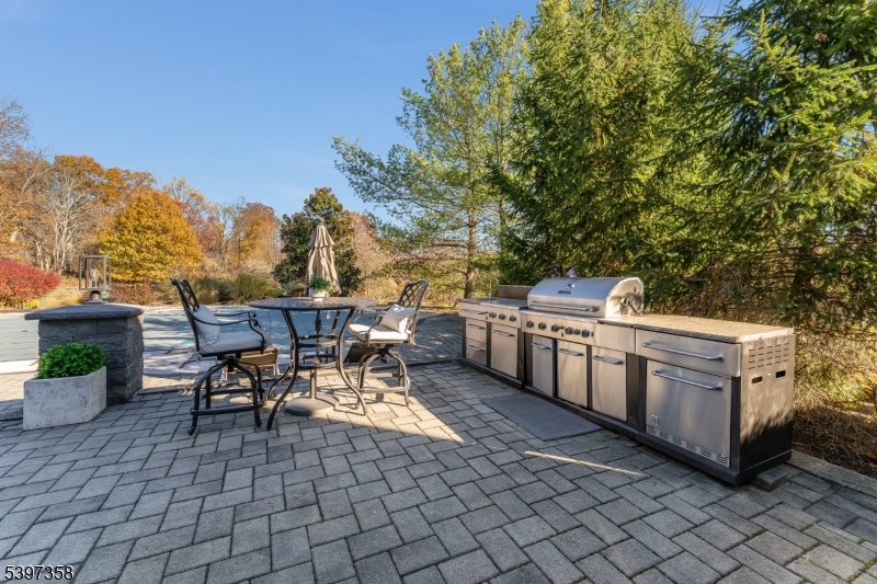 16 Perry Road Annandale, NJ 08801 - Photo 18 of 49 a view of a patio with table and chairs
