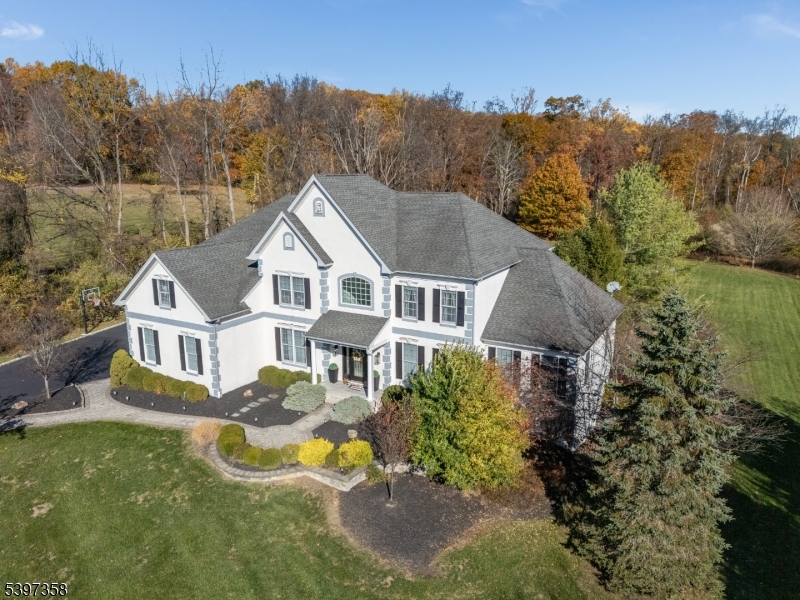 16 Perry Road Annandale, NJ 08801 - Photo 22 of 49 a aerial view of a house next to a yard