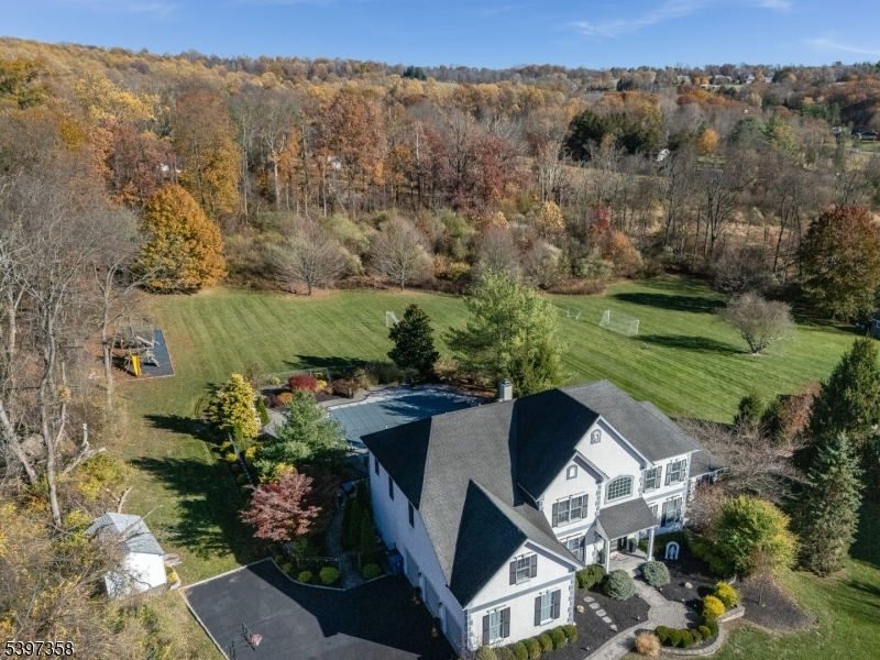 16 Perry Road Annandale, NJ 08801 - Photo 23 of 49 an aerial view of a house with a yard