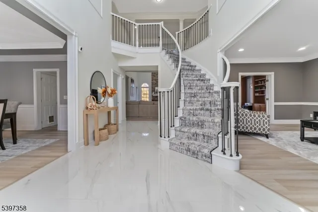 a view of livingroom with hardwood floor and ceiling fan