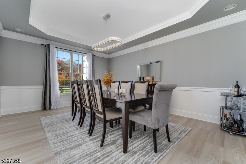16 Perry Road Annandale, NJ 08801 - Photo 5 of 49 a view of a dining room with furniture and wooden floor