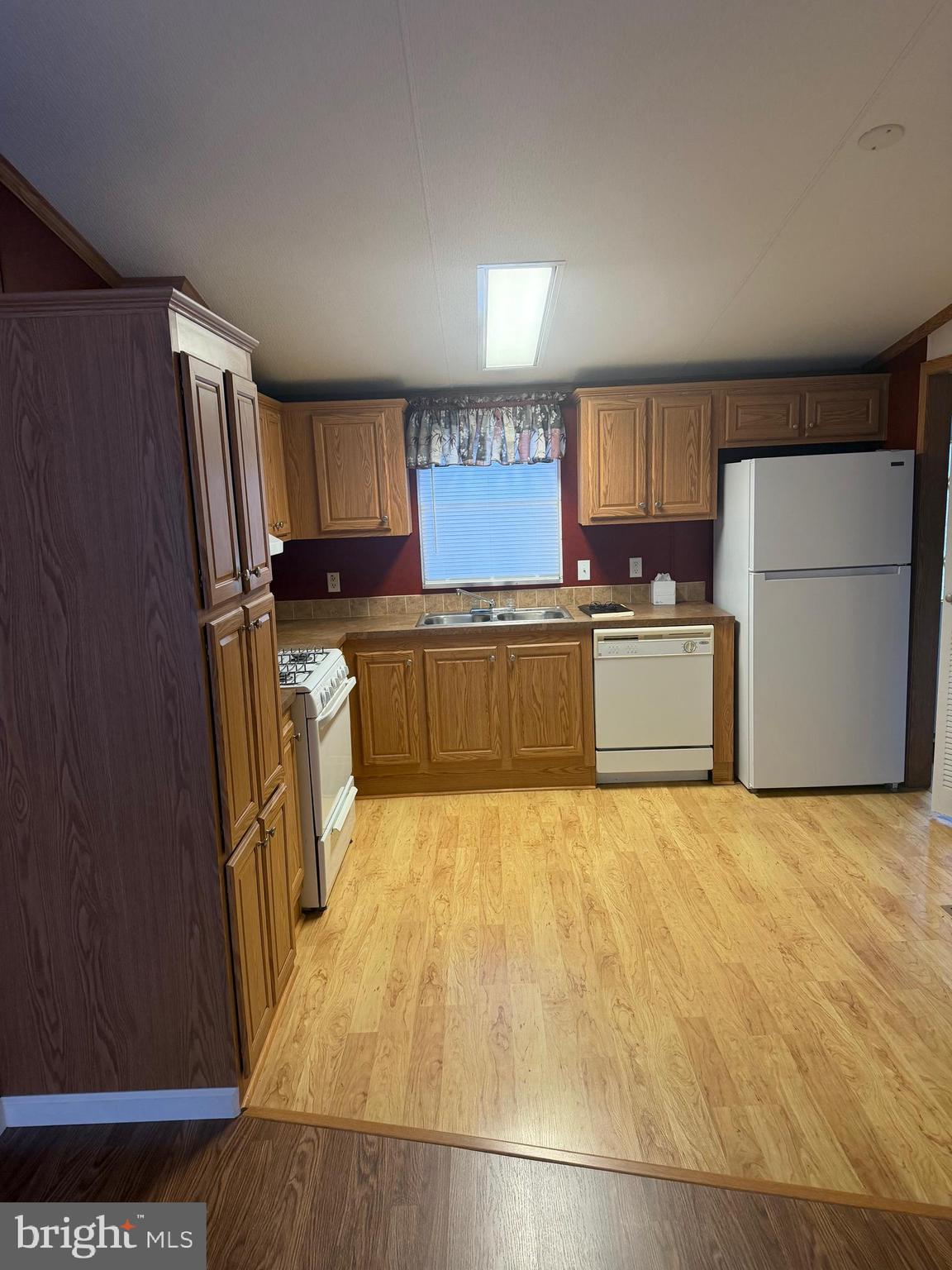 85 Cherokee Drive Windsor, PA 17366 - Photo 6 of 23 a large kitchen with a refrigerator a stove top oven a sink and dishwasher