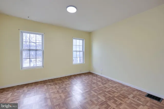 an empty room with windows