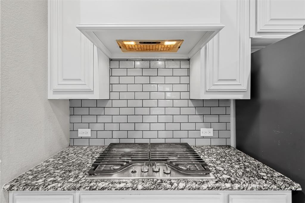 1174 Spring Cress Burleson, TX 76028 - Photo 16 of 37 Designer backsplash and gas cooktop