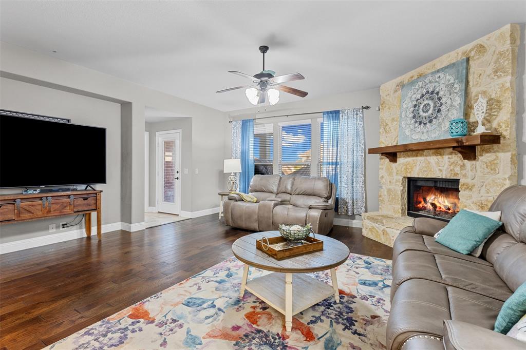 1174 Spring Cress Burleson, TX 76028 - Photo 9 of 37 Comfort at its best with a gorgeous stone fireplace