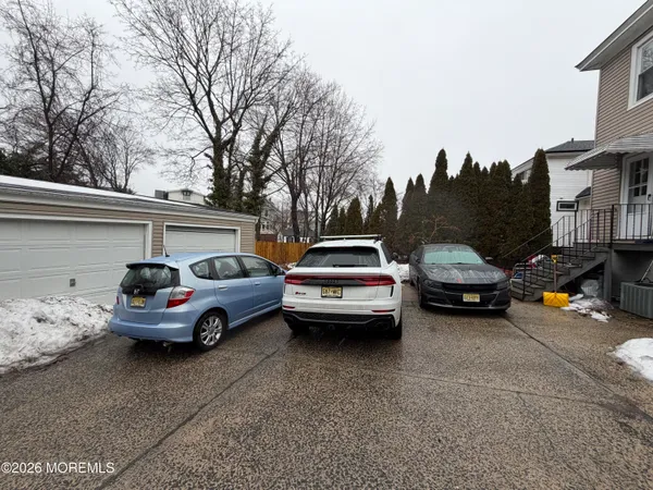 a car parked in front of a house