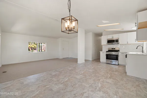 a view of kitchen and microwave