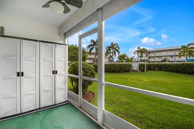 a view of a porch with a yard