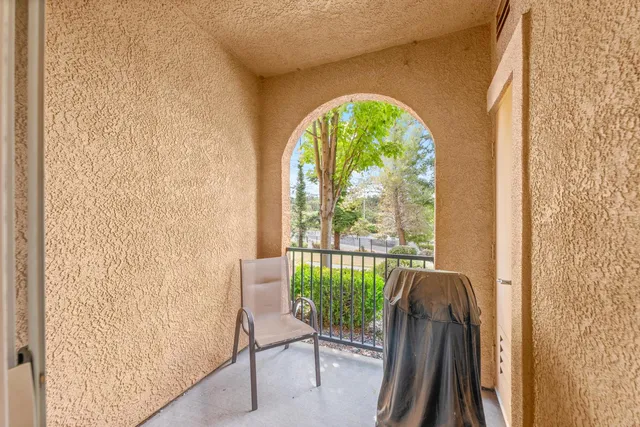 a bathroom with a sink a large mirror and a bathtub