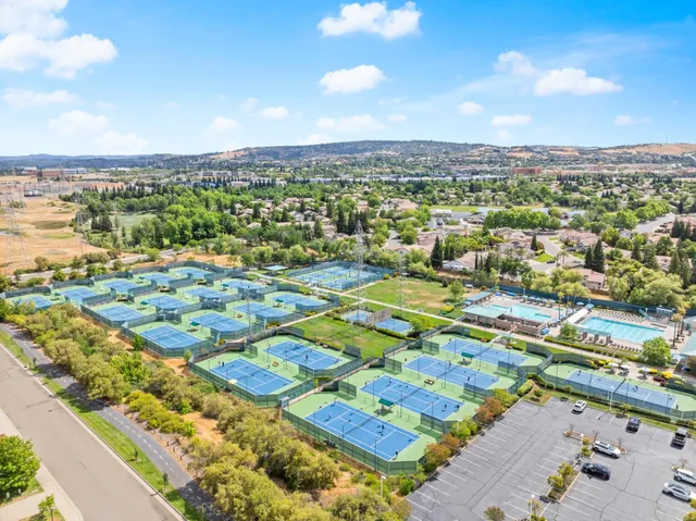 an aerial view of a city with lots of residential buildings