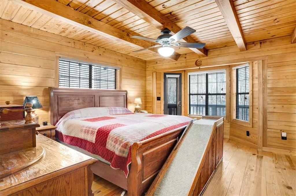 217 Browning Road Villa Rica, GA 30180 - Photo 16 of 40 a bedroom with a bed next to a window