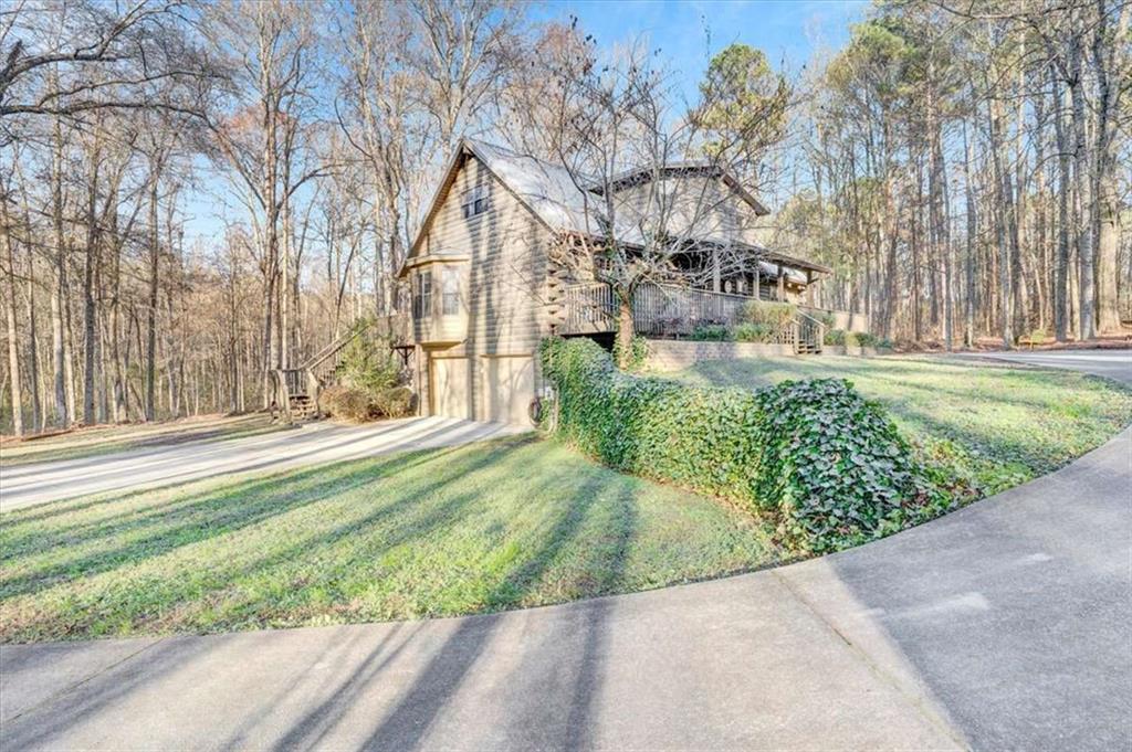 217 Browning Road Villa Rica, GA 30180 - Photo 2 of 40 a front view of a house with garden