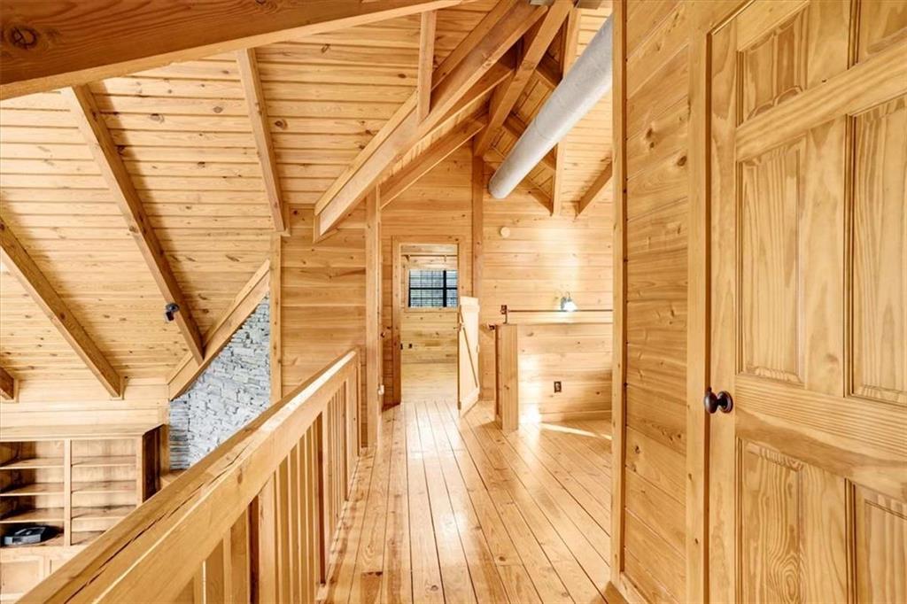 217 Browning Road Villa Rica, GA 30180 - Photo 21 of 40 a view of a balcony with wooden floor and door