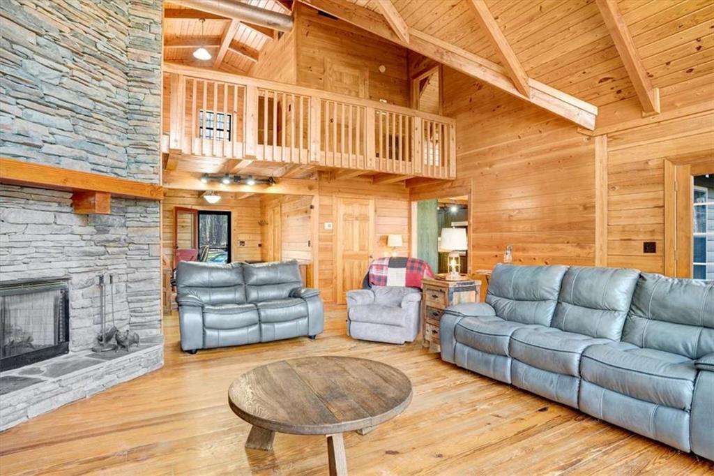 217 Browning Road Villa Rica, GA 30180 - Photo 6 of 40 a view of a patio with couches and a fire pit