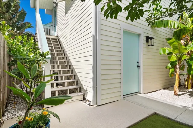 a view of entryway with wooden floor