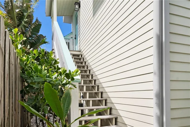 a room with a table and chairs