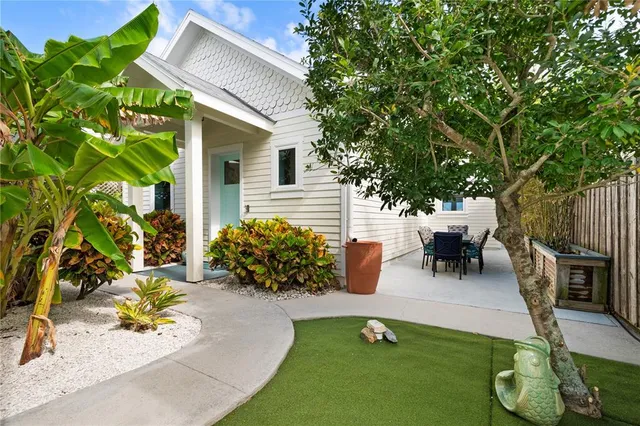swimming pool view with a seating space