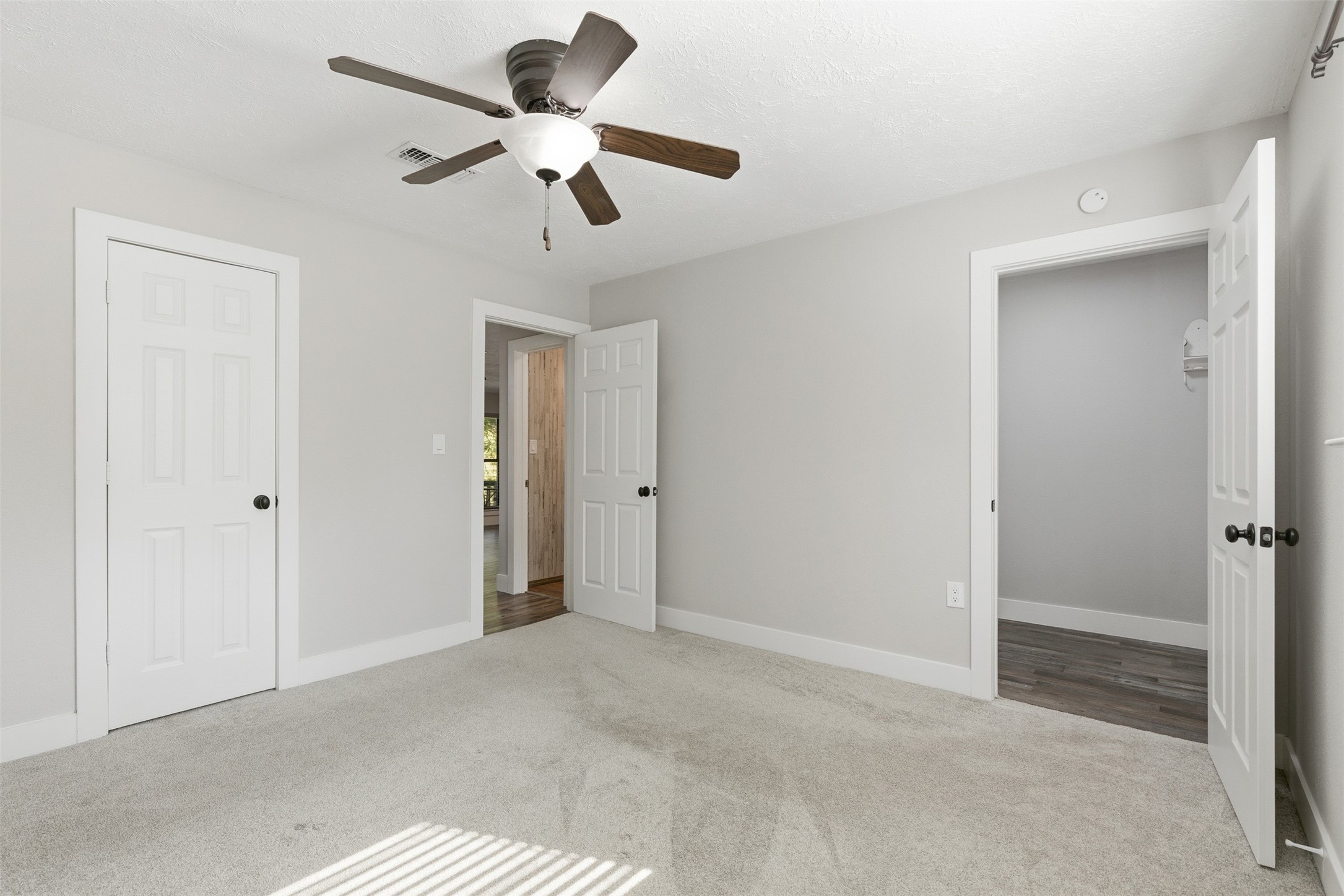 94 Gov Bell Drive Point Blank, TX 77364 - Photo 23 of 49 a view of a livingroom with a ceiling fan
