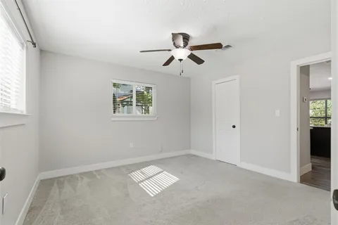 a view of a entryway with a wooden fence
