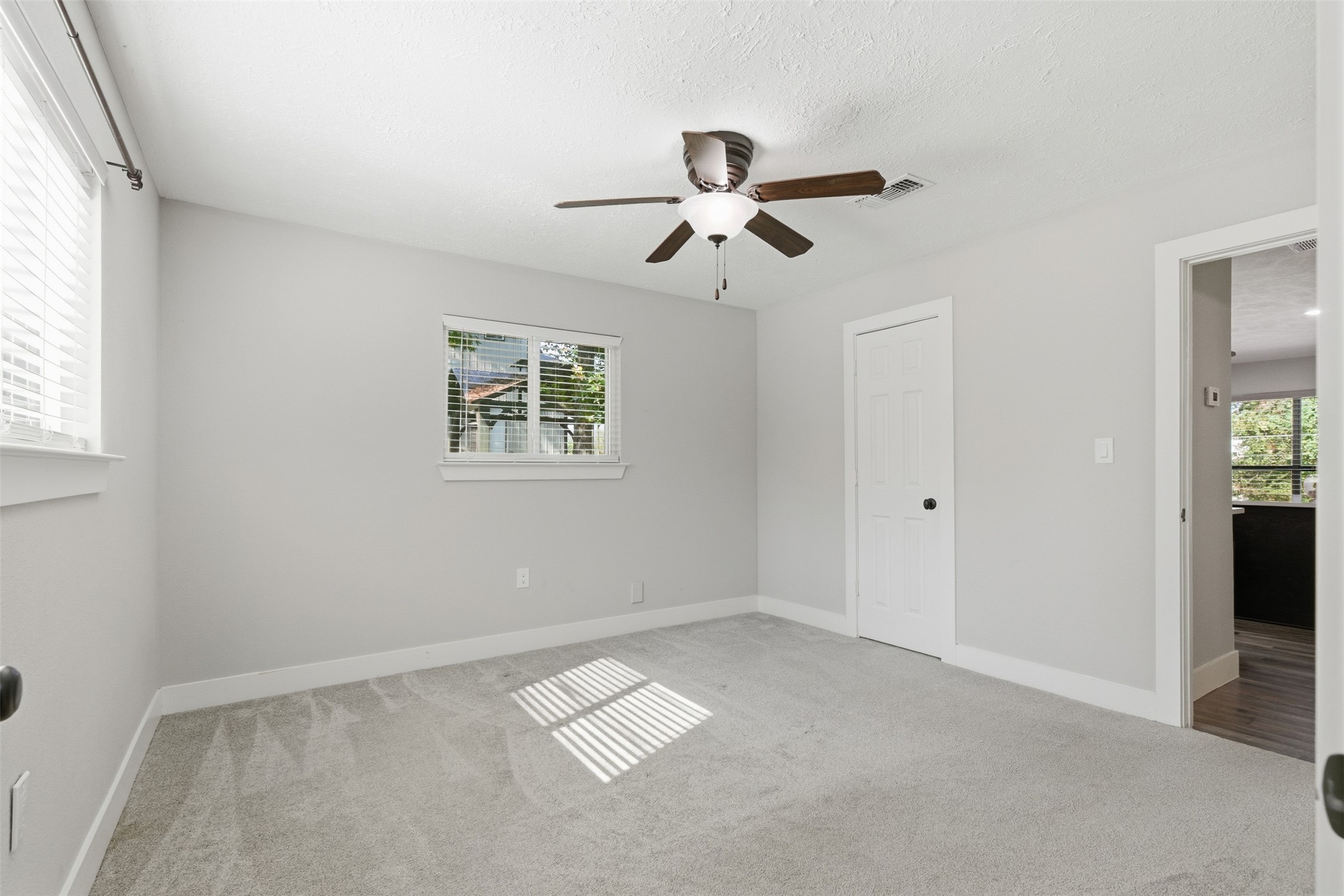 94 Gov Bell Drive Point Blank, TX 77364 - Photo 24 of 49 a view of room with window and ceiling fan