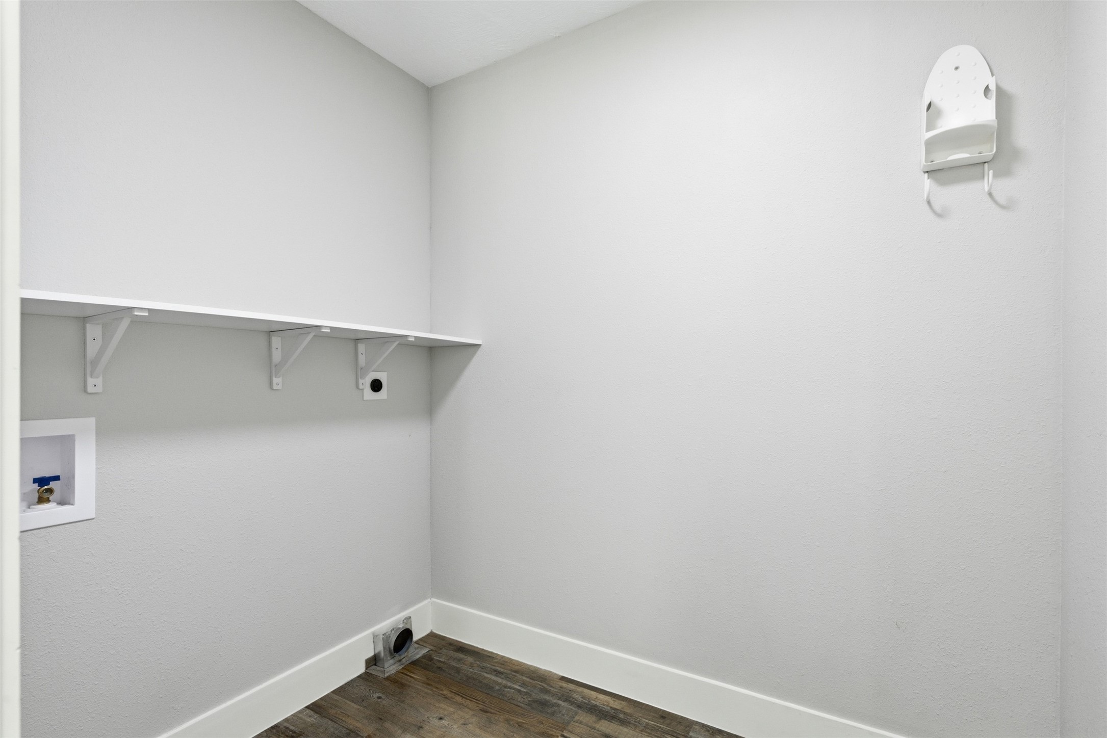 94 Gov Bell Drive Point Blank, TX 77364 - Photo 25 of 49 Convenient in-house laundry room located just off the second bedroom — spacious enough for two full-size units and designed to make daily chores simple and efficient.