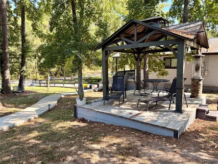 a view of a lake with a building in the background