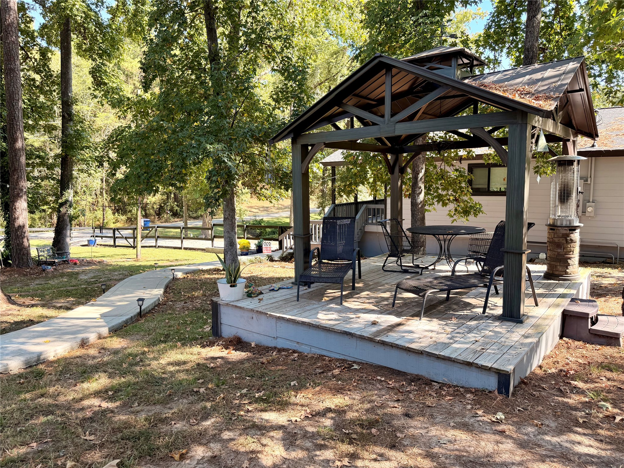 94 Gov Bell Drive Point Blank, TX 77364 - Photo 33 of 49 a view of a park with sitting area