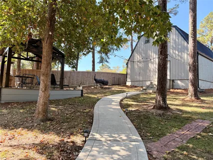 a view of a swimming pool with seating area