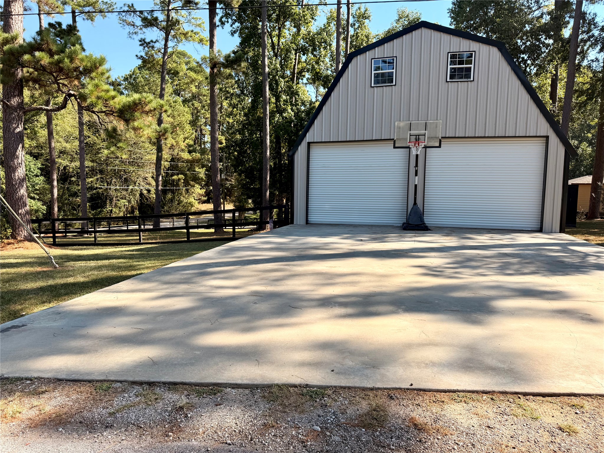 94 Gov Bell Drive Point Blank, TX 77364 - Photo 36 of 49 a view of a house with a yard
