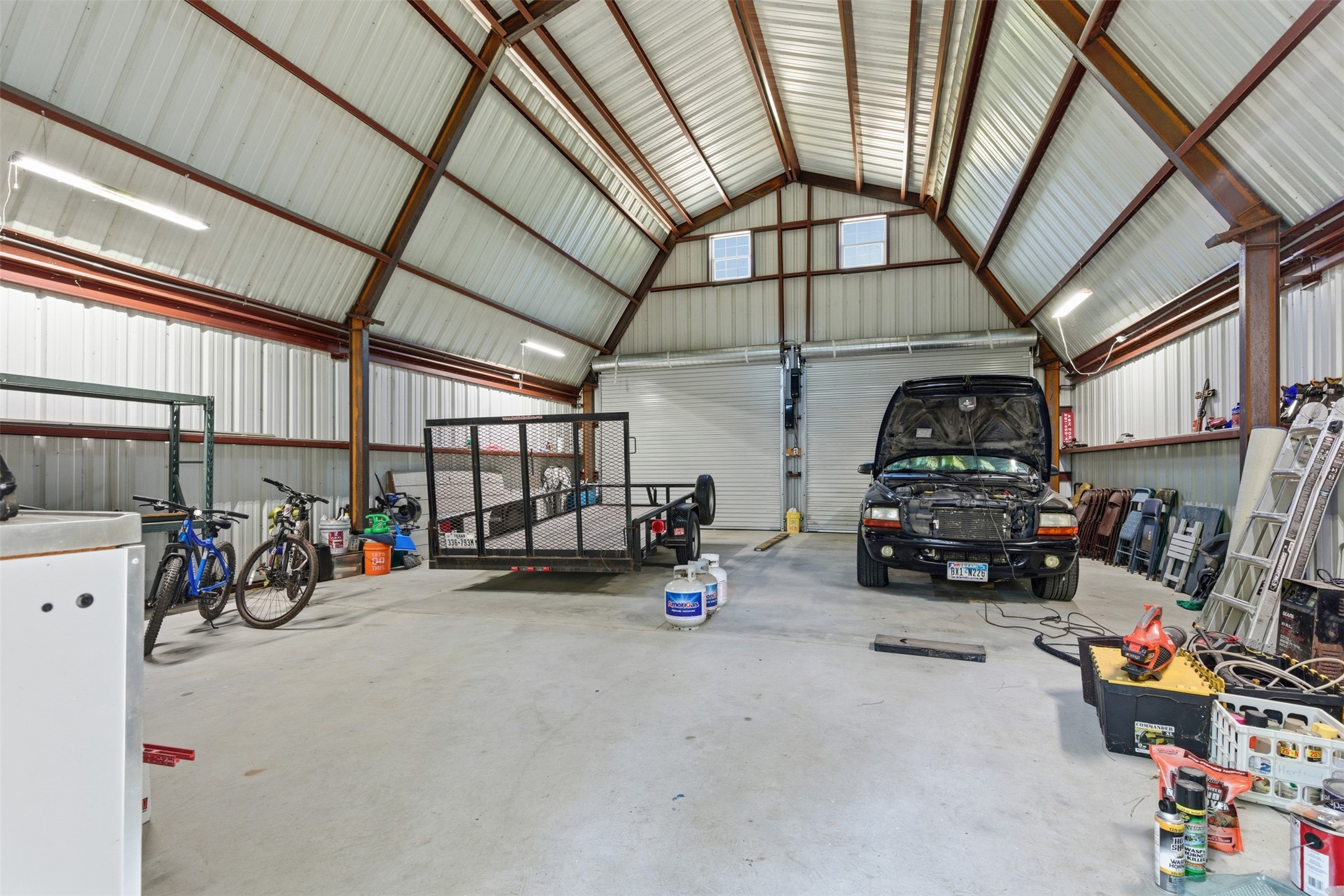 94 Gov Bell Drive Point Blank, TX 77364 - Photo 37 of 49 a view of garage with cars