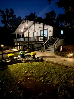 a view of a swimming pool with an outdoor seating