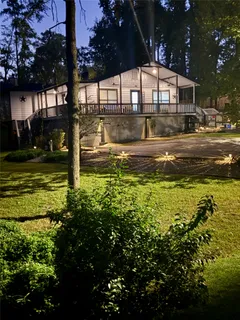 a view of a fountain in front of a house