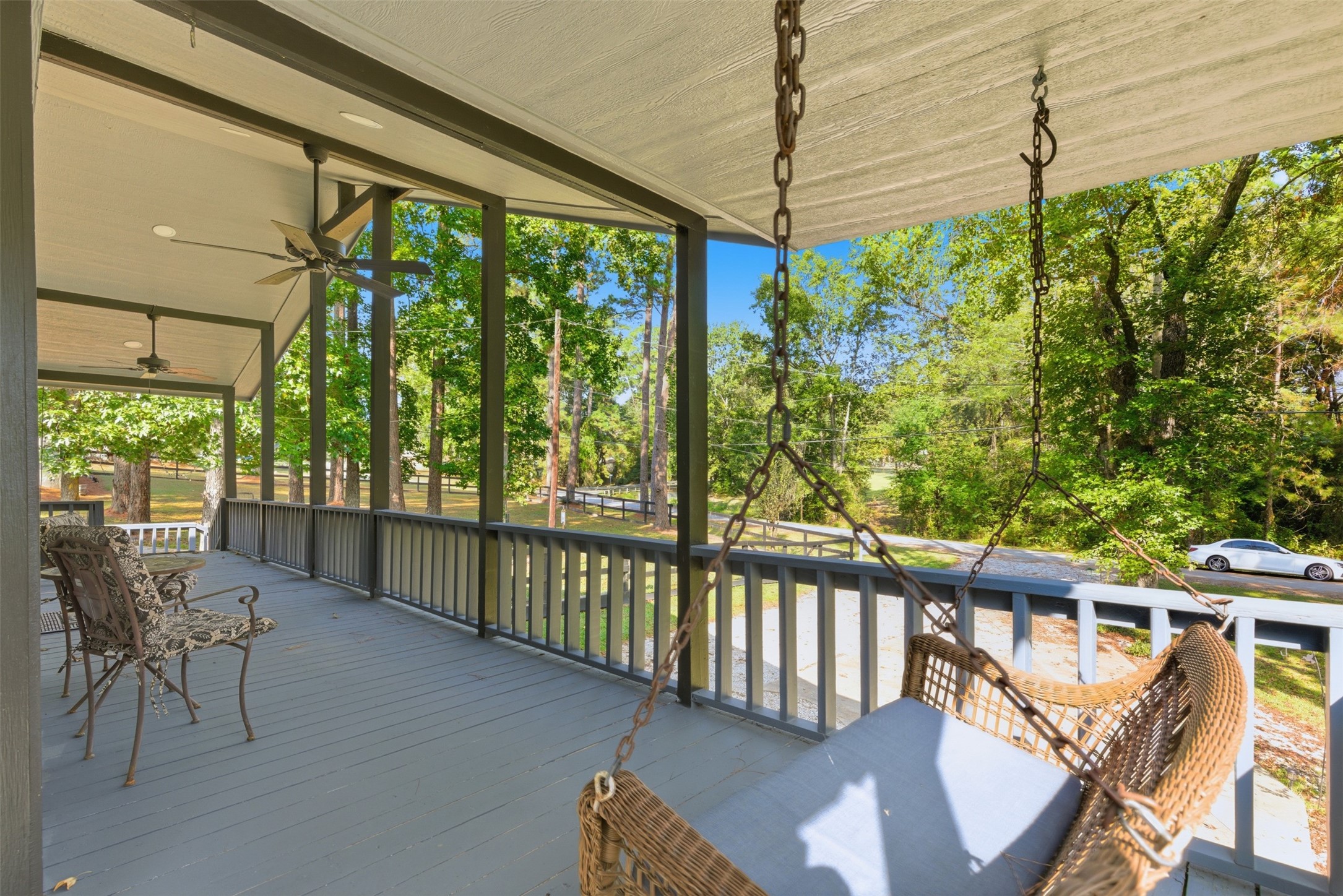 94 Gov Bell Drive Point Blank, TX 77364 - Photo 8 of 49 a view of a porch with furniture and garden
