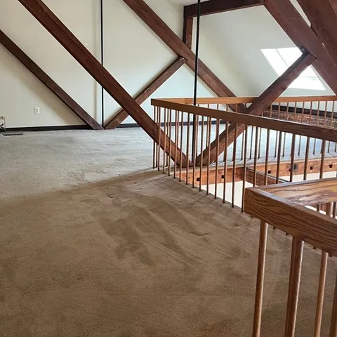 a view of staircase and with an umbrella