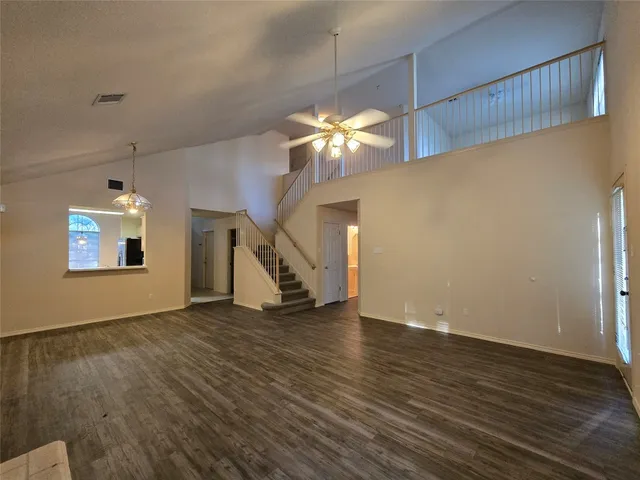 a view of a livingroom with wooden floor