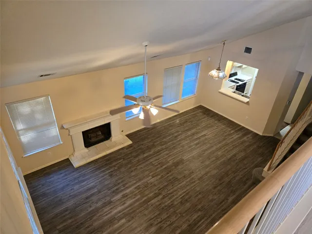 a view of kitchen with furniture and fireplace