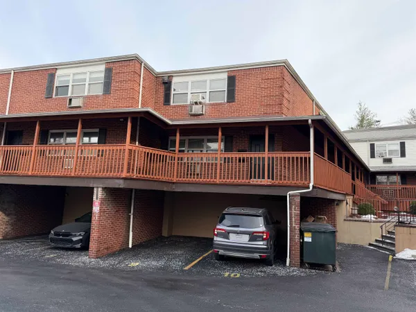 a front view of a house with a balcony