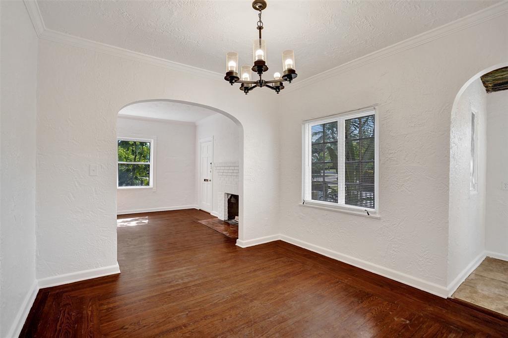 1818 Florida Avenue West Palm Beach, FL 33401 - Photo 18 of 50 a view of a room with wooden floor chandelier and windows