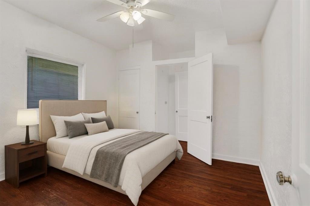 1818 Florida Avenue West Palm Beach, FL 33401 - Photo 25 of 50 a bedroom with a bed and wooden floor