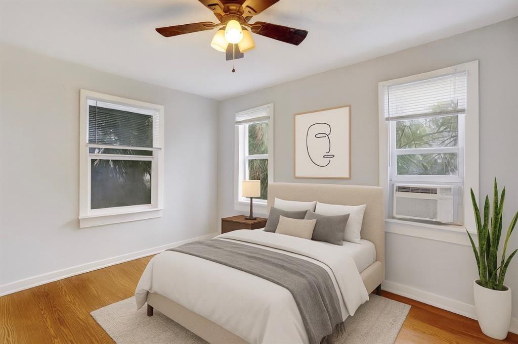 1818 Florida Avenue West Palm Beach, FL 33401 - Photo 41 of 50 a bedroom with a large bed and a window