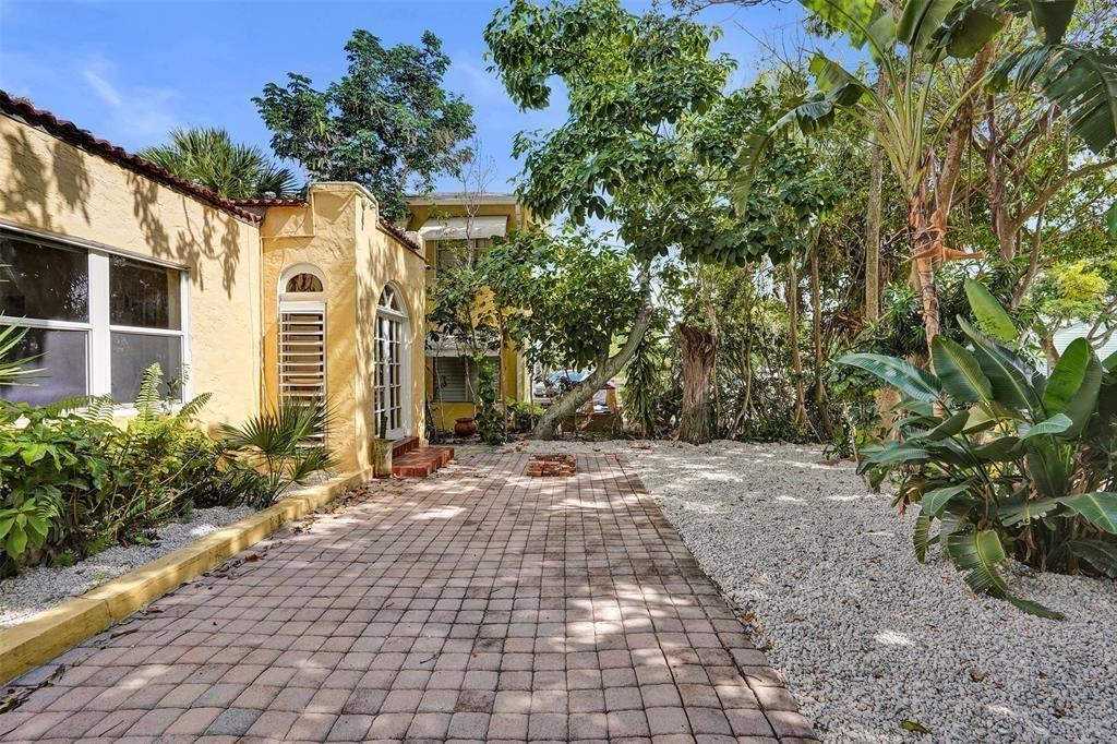 1818 Florida Avenue West Palm Beach, FL 33401 - Photo 5 of 50 a view of a pathway with a house