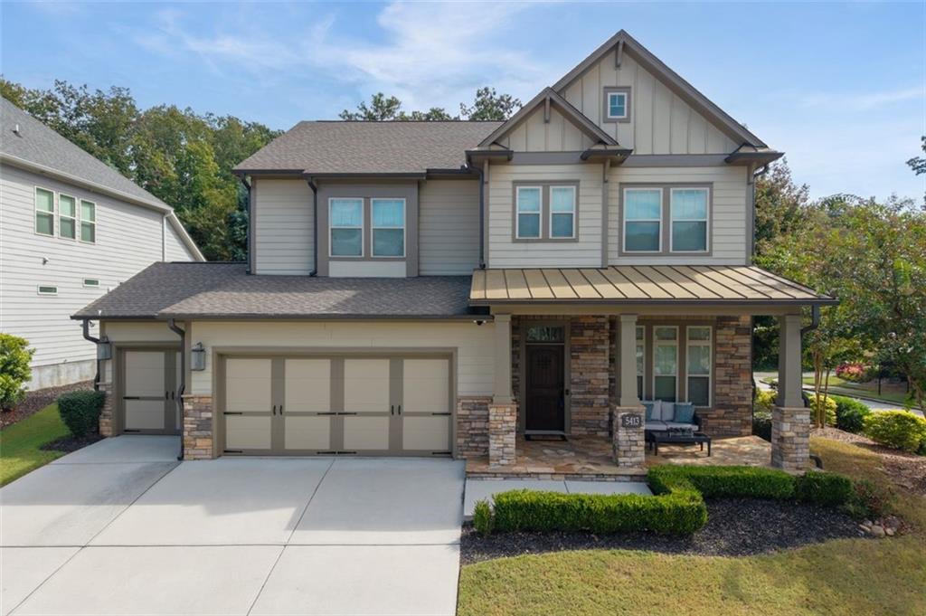 5413 Bluestone Circle Mableton, GA 30126 - Photo 1 of 1 a view of a white house with a yard plants and large tree
