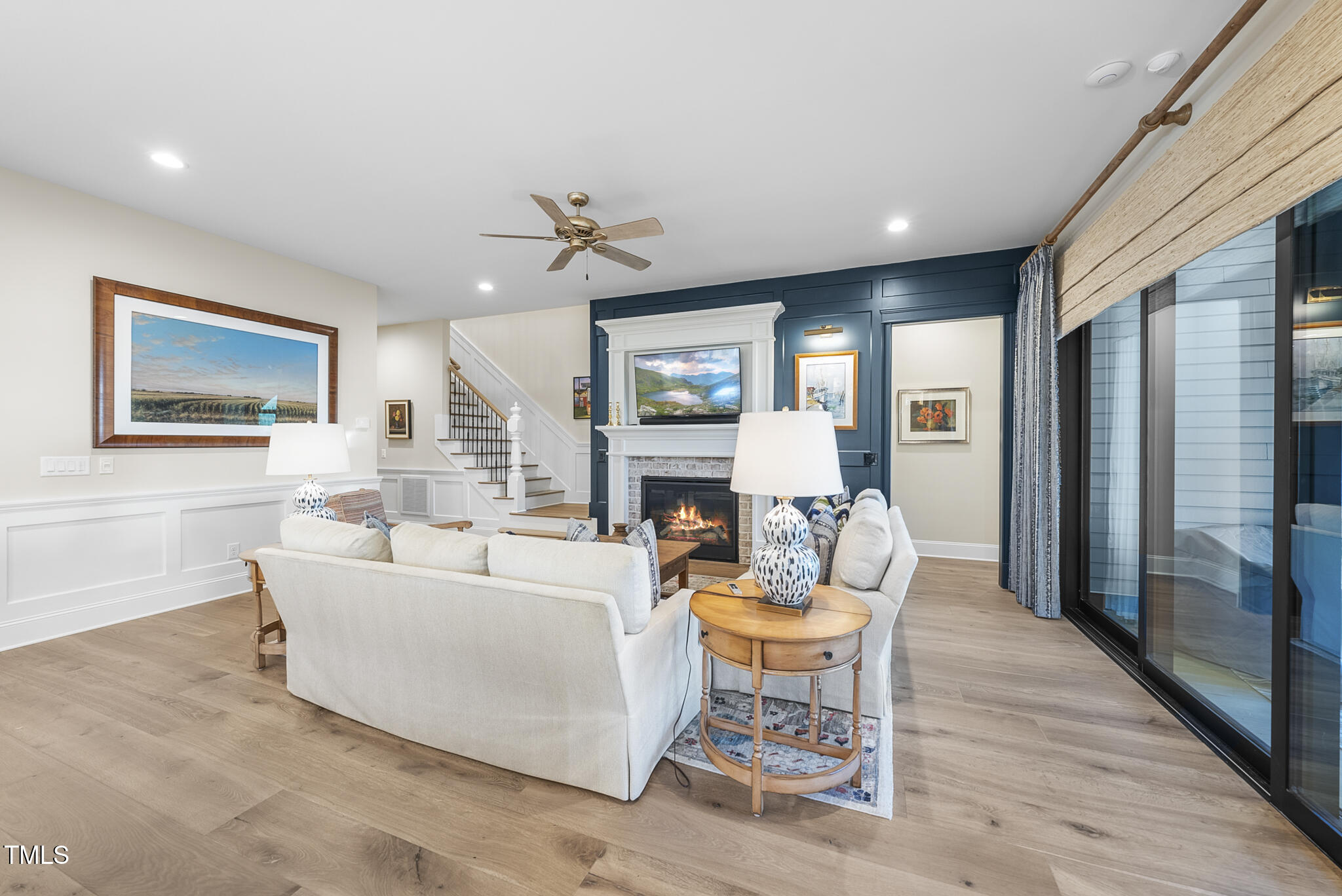 3018 Farrior Road Raleigh, NC 27607 - Photo 11 of 59 a living room with fireplace furniture and a fireplace