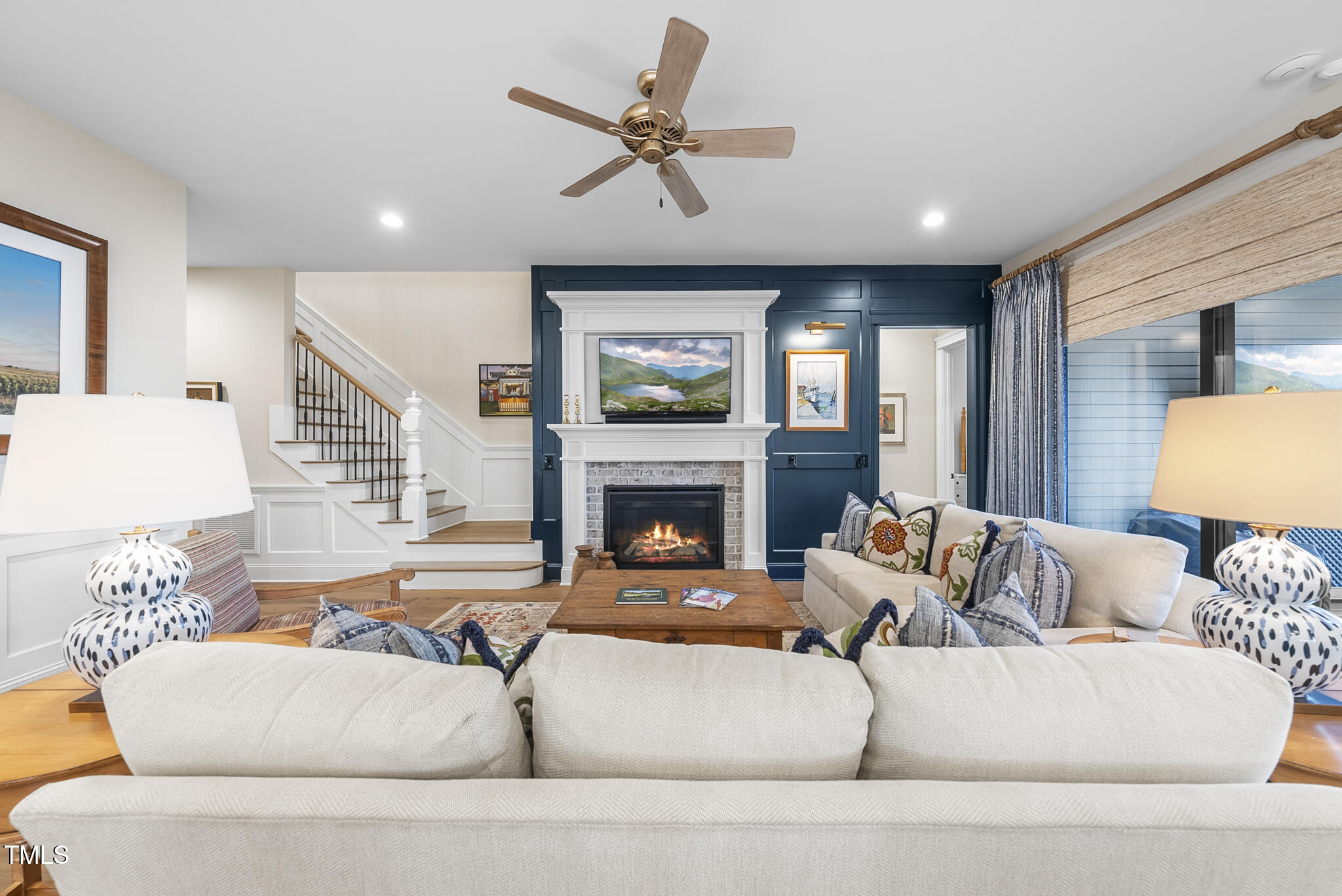 3018 Farrior Road Raleigh, NC 27607 - Photo 12 of 59 a living room with furniture and a fireplace