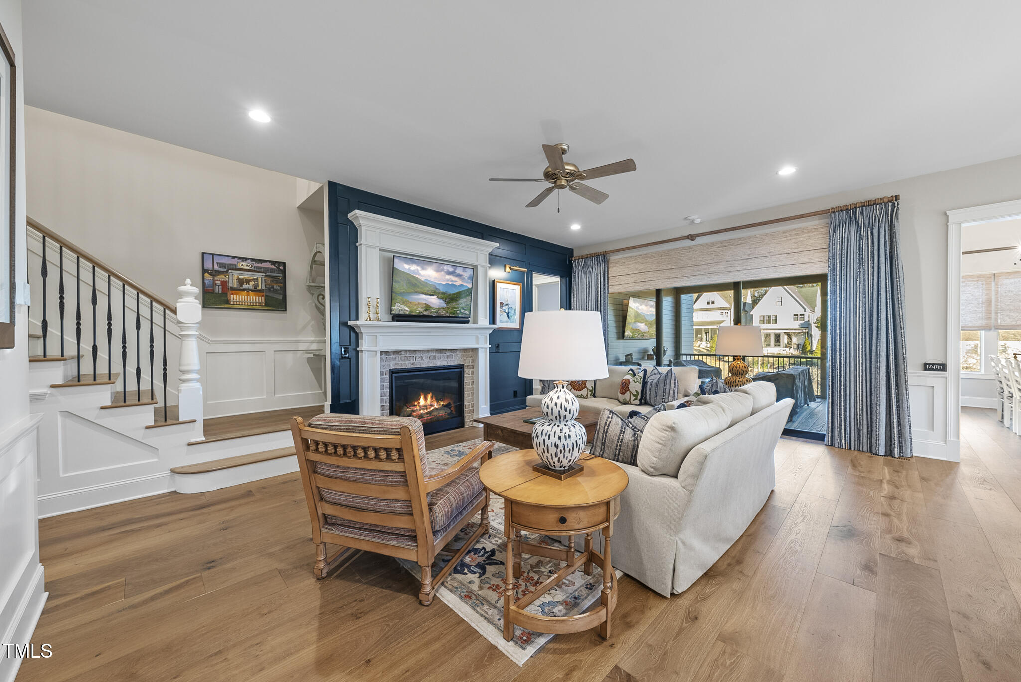 3018 Farrior Road Raleigh, NC 27607 - Photo 3 of 59 a living room with fireplace furniture and a wooden floor