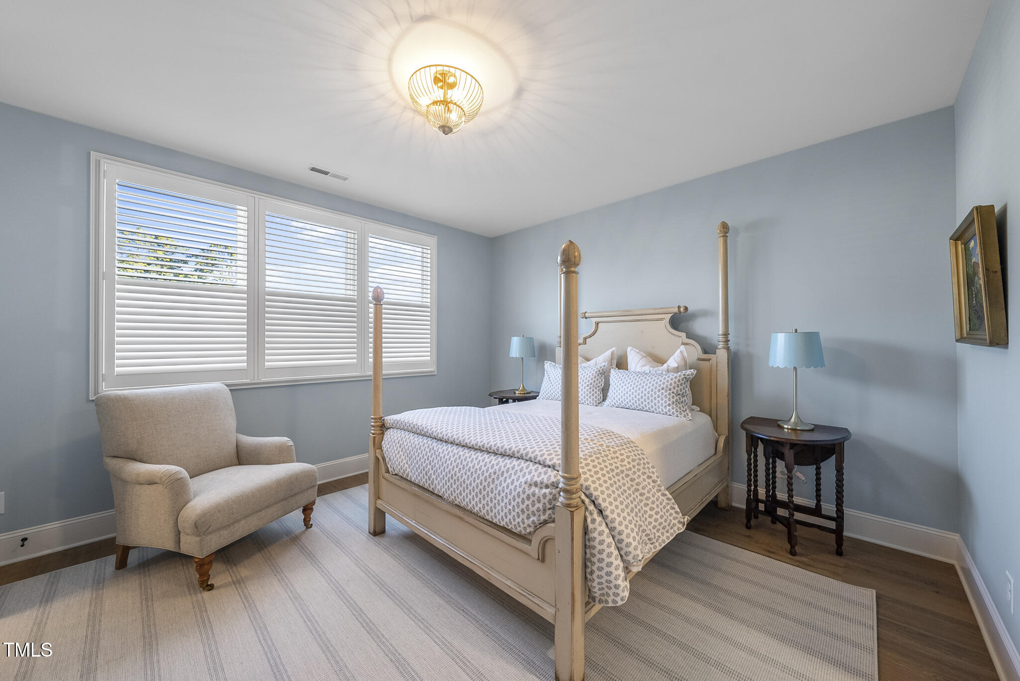 3018 Farrior Road Raleigh, NC 27607 - Photo 31 of 59 a bedroom with a bed and a couch