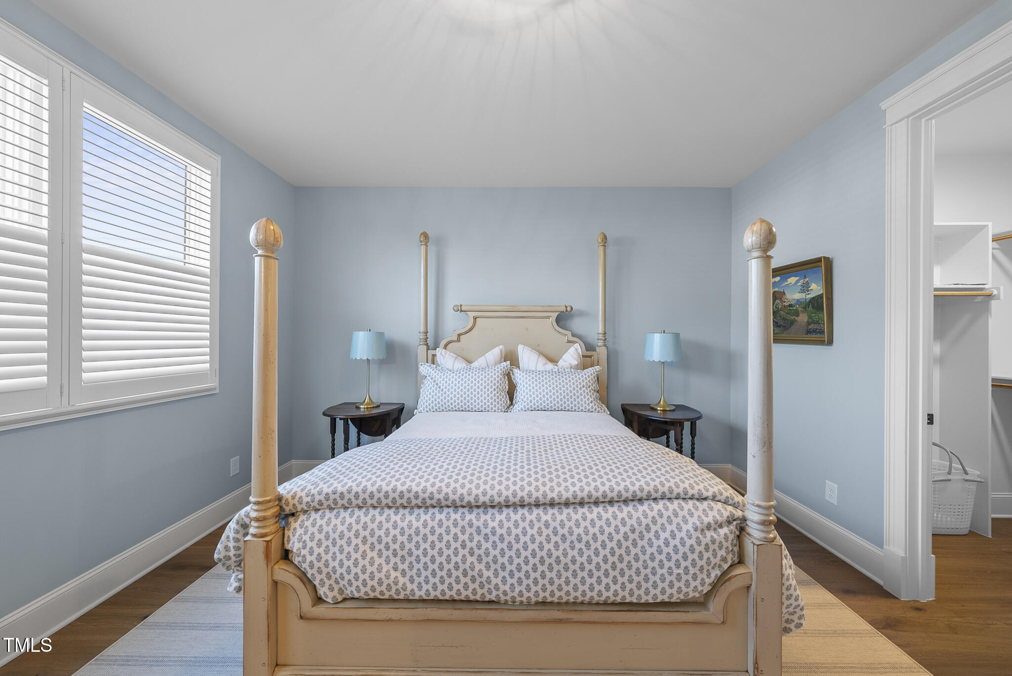 3018 Farrior Road Raleigh, NC 27607 - Photo 32 of 59 a large bed sitting in a bedroom next to a window and a chair