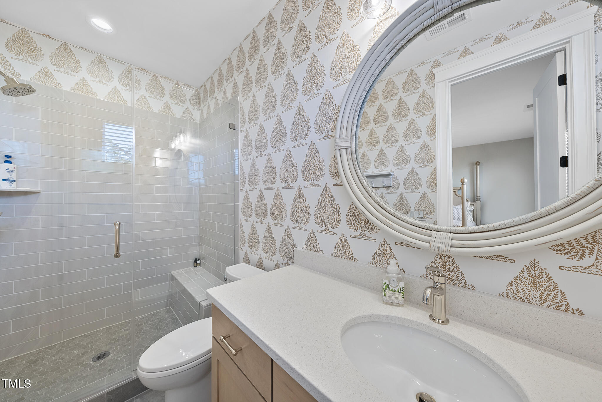 3018 Farrior Road Raleigh, NC 27607 - Photo 34 of 59 a bathroom with a sink a toilet and shower