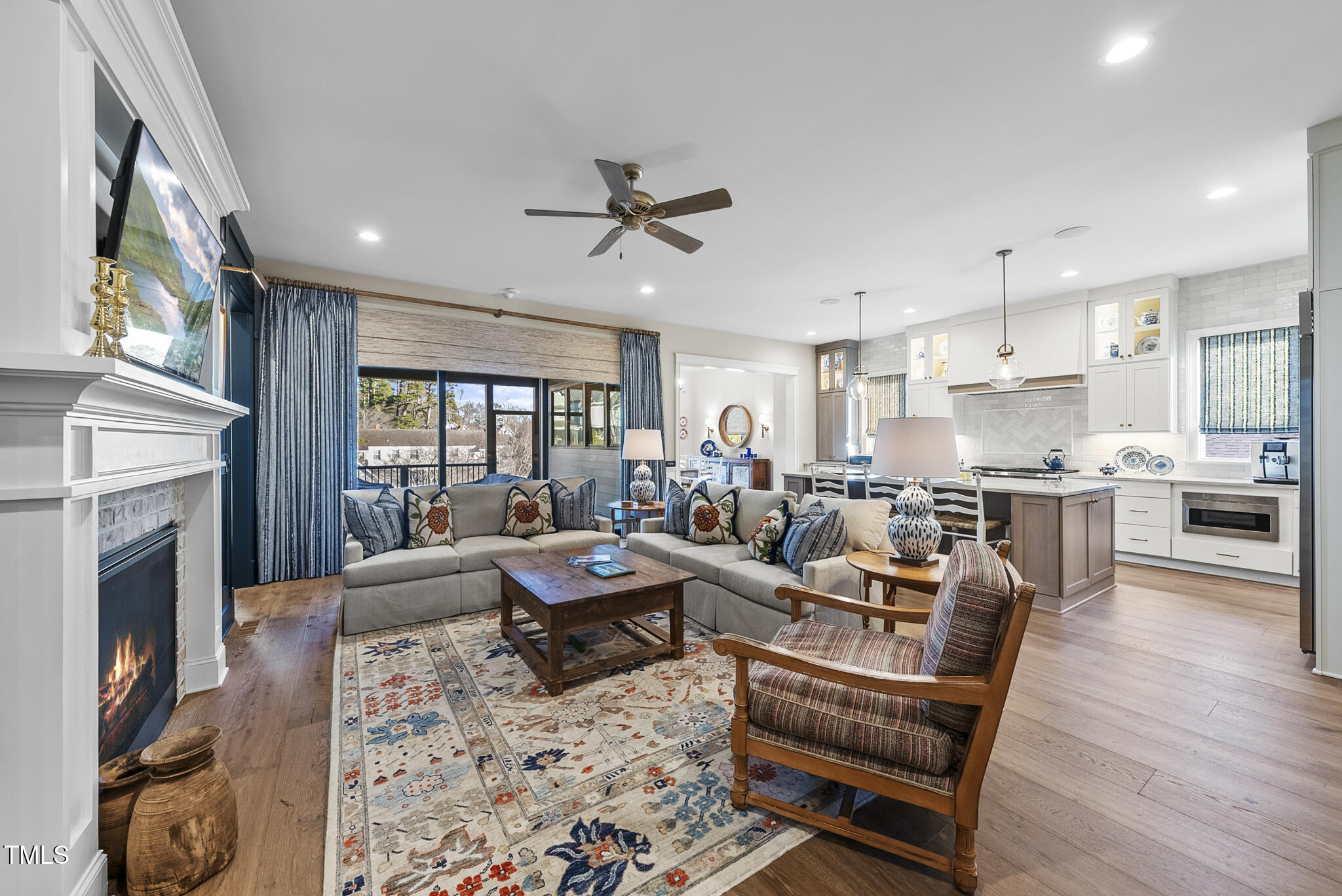 3018 Farrior Road Raleigh, NC 27607 - Photo 4 of 59 a living room with fireplace furniture and a fireplace