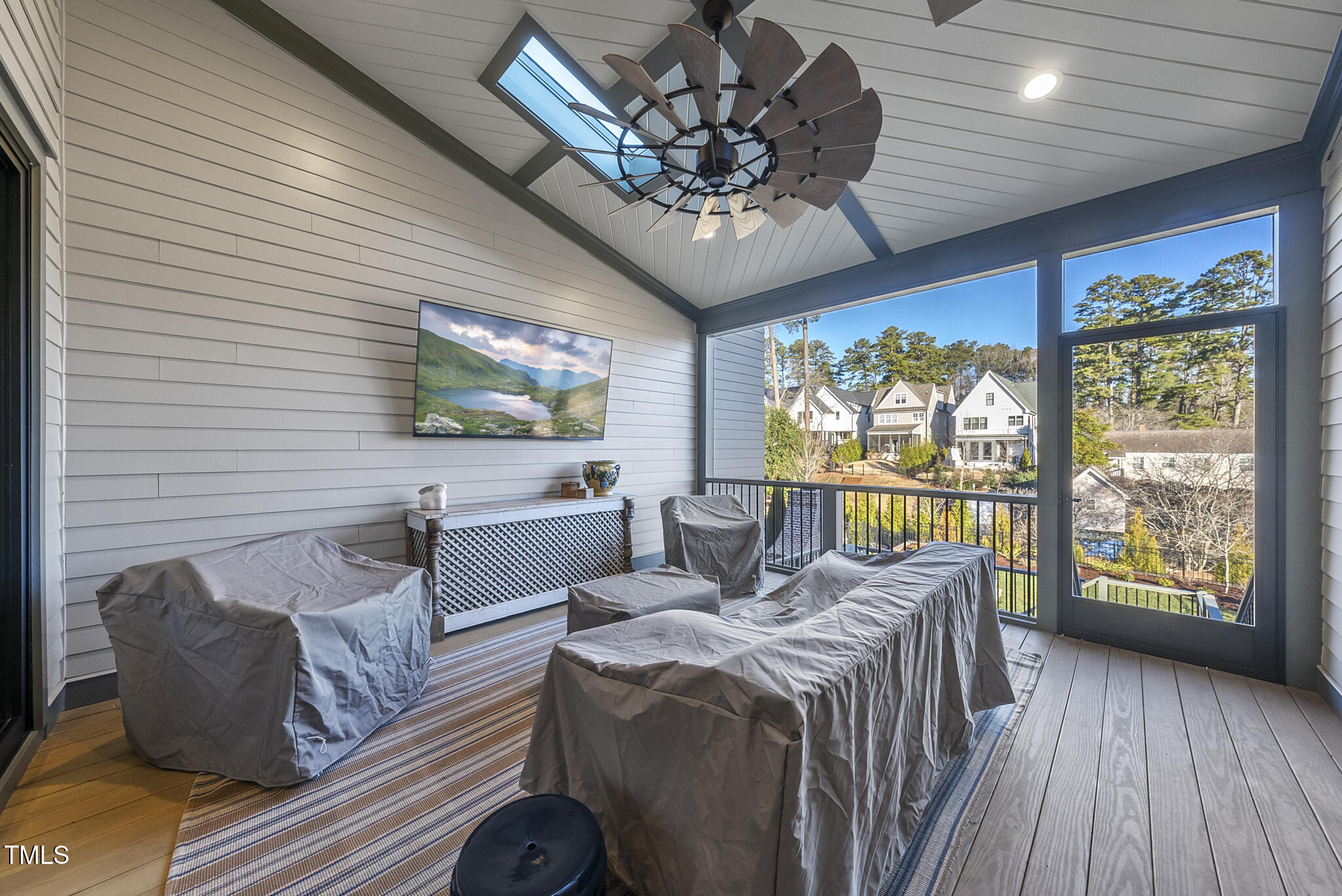 3018 Farrior Road Raleigh, NC 27607 - Photo 42 of 59 a bedroom with furniture and large windows